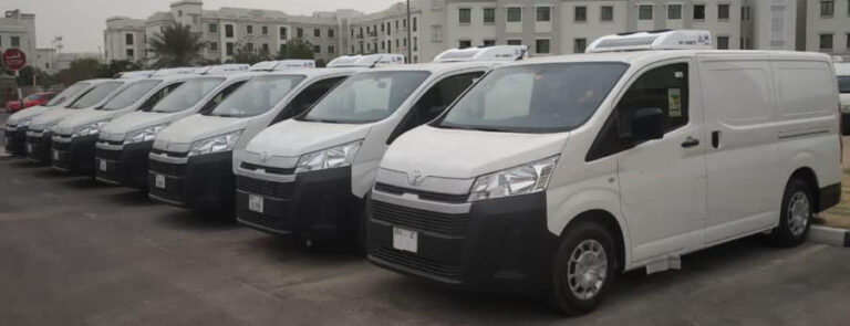 Refrigerated chiller van parked outside a store for frozen goods delivery in Dubai