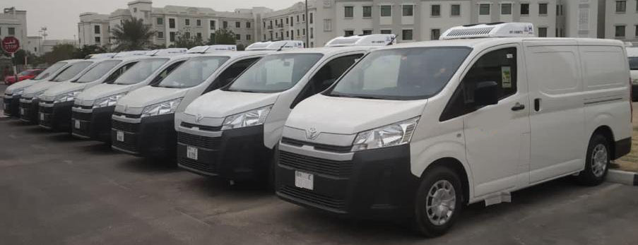 Refrigerated chiller van parked outside a store for frozen goods delivery in Dubai