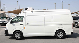Refrigerated chiller truck delivering frozen goods in UAE