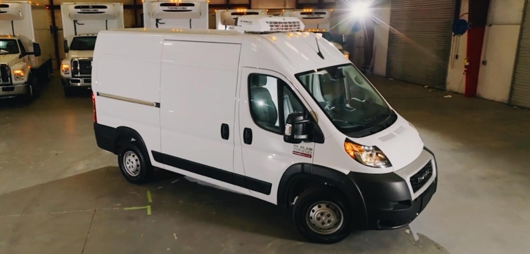 Chiller van parked outside hospital for urgent medical supply transport